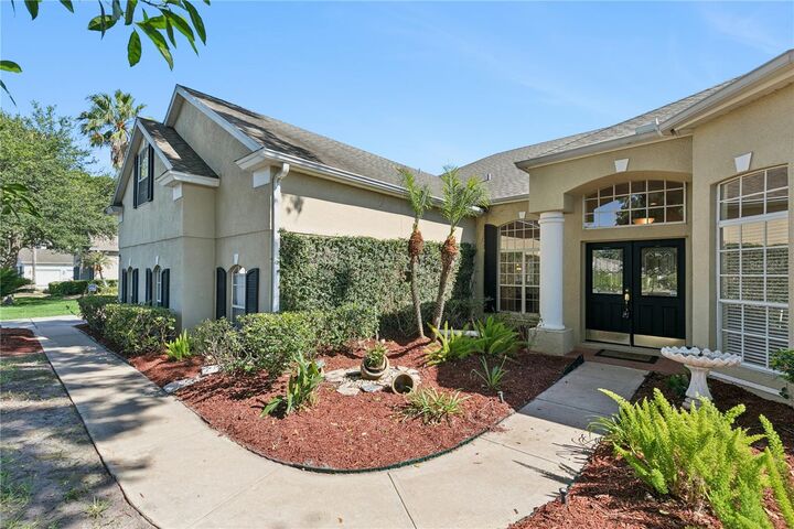 Property Photo:  5700 Climbing Rose Way  FL 32771 