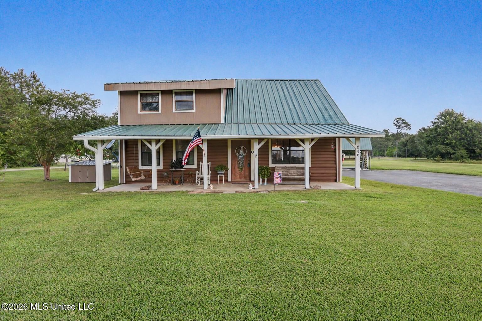 Property Photo:  6270 Lower Bay Road  MS 39520 