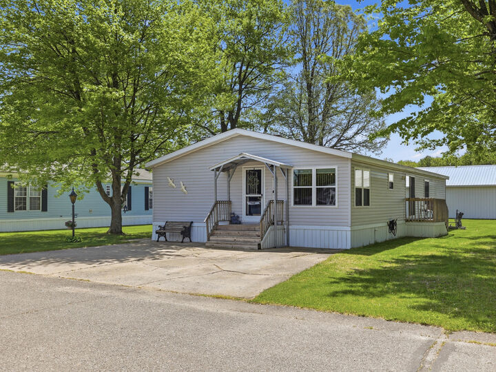 Property Photo:  166 Aspen Street NE  MI 49319 