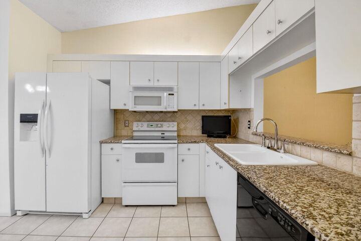 Property Photo:  164 Sausalito Drive  FL 33436 