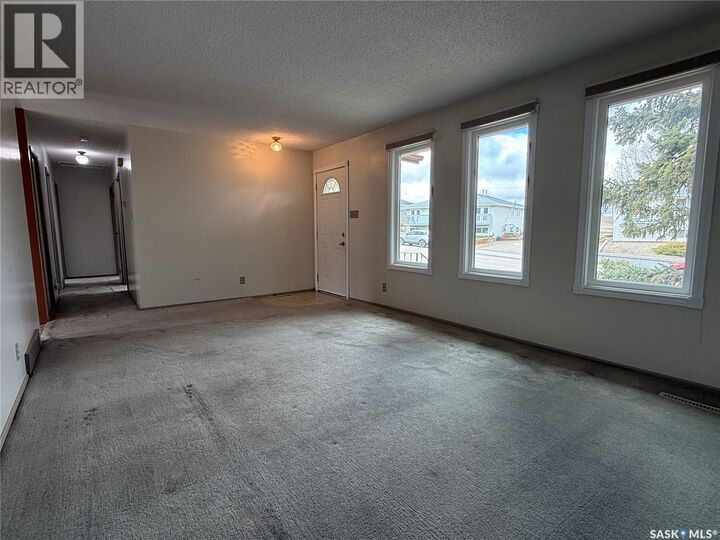 Property Photo:  723 Field Drive  SK S9H 4C4 