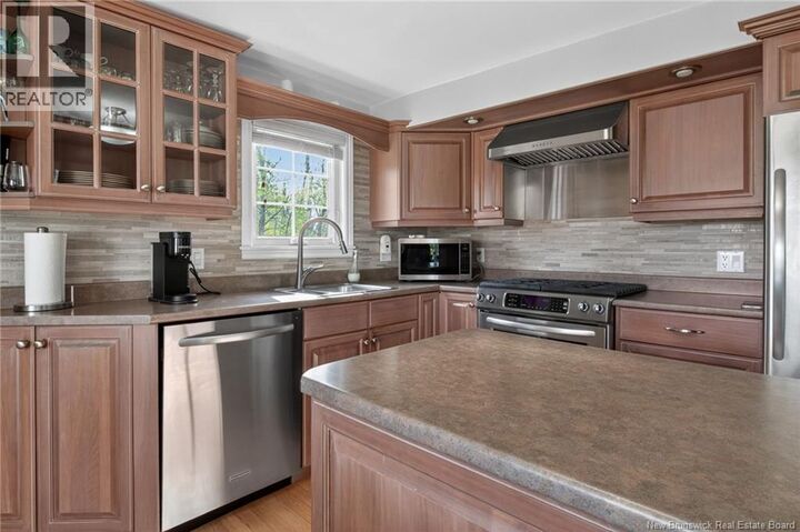 Property Photo:  83 Beau-Rivage Street  NB E4M 1M5 