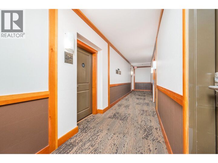 Property Photo: 107 Village Centre Court 214 BC V1H 1Y8