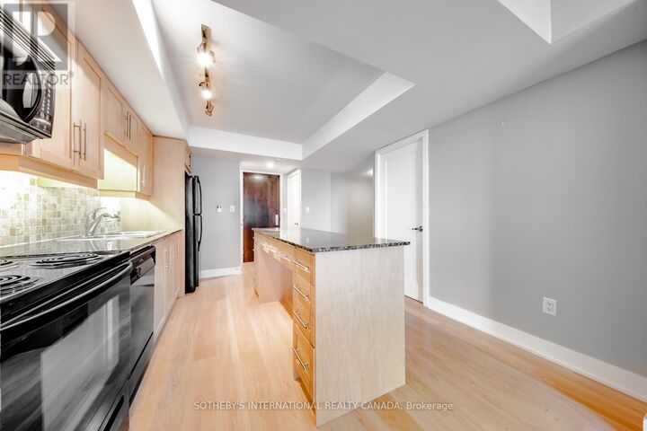 Property Photo: 20 Blue Jays Way 1705 ON M5V 3W6
