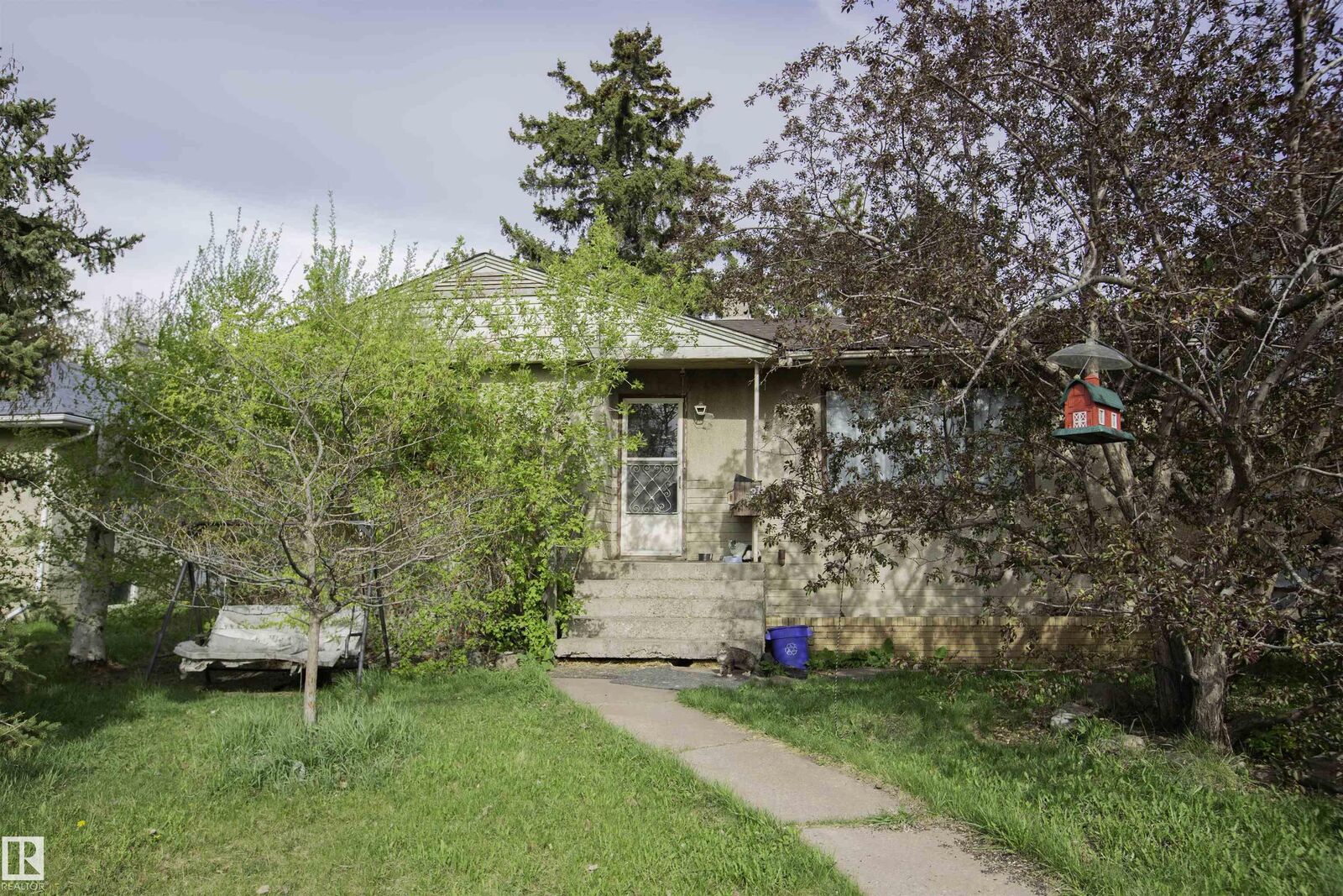 Property Photo:  11327 131 Street NW  AB T5M 1C5 