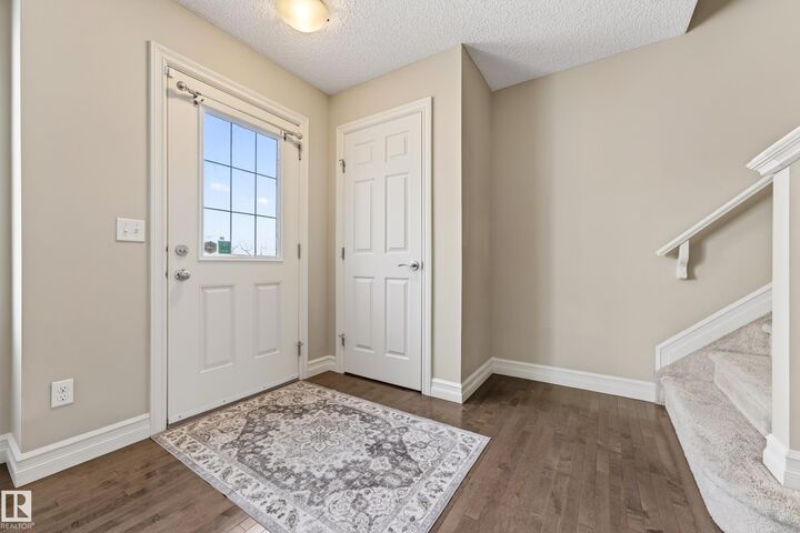 Property Photo:  14621 121 Street NW 6  AB T5X 0H2 