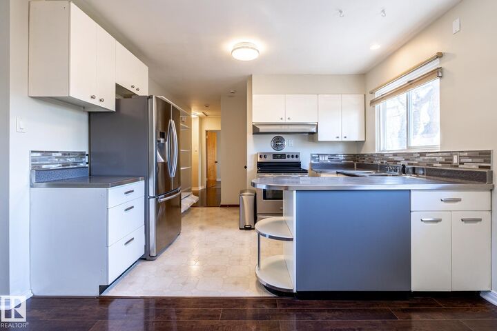 Property Photo:  5703 106 Avenue NW  AB T6A 1G1 