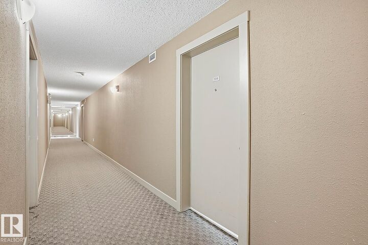 Property Photo: 11803 22 Avenue SW 109 AB T6W 2R9
