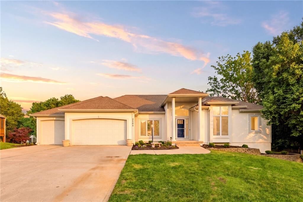 Property Photo:  2404 SW Wintergreen Court  MO 64081 