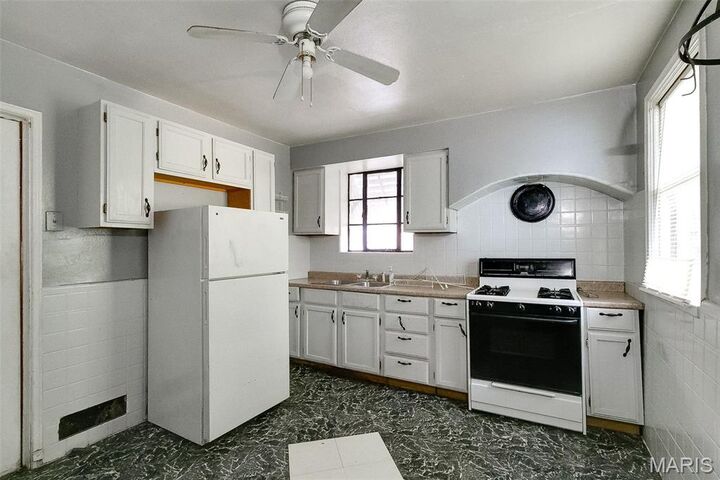 Property Photo:  6949 Claremore Drive  MO 63121 