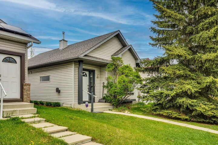Property Photo: 42 Harvest Rose Circle NE AB T3K 4M5