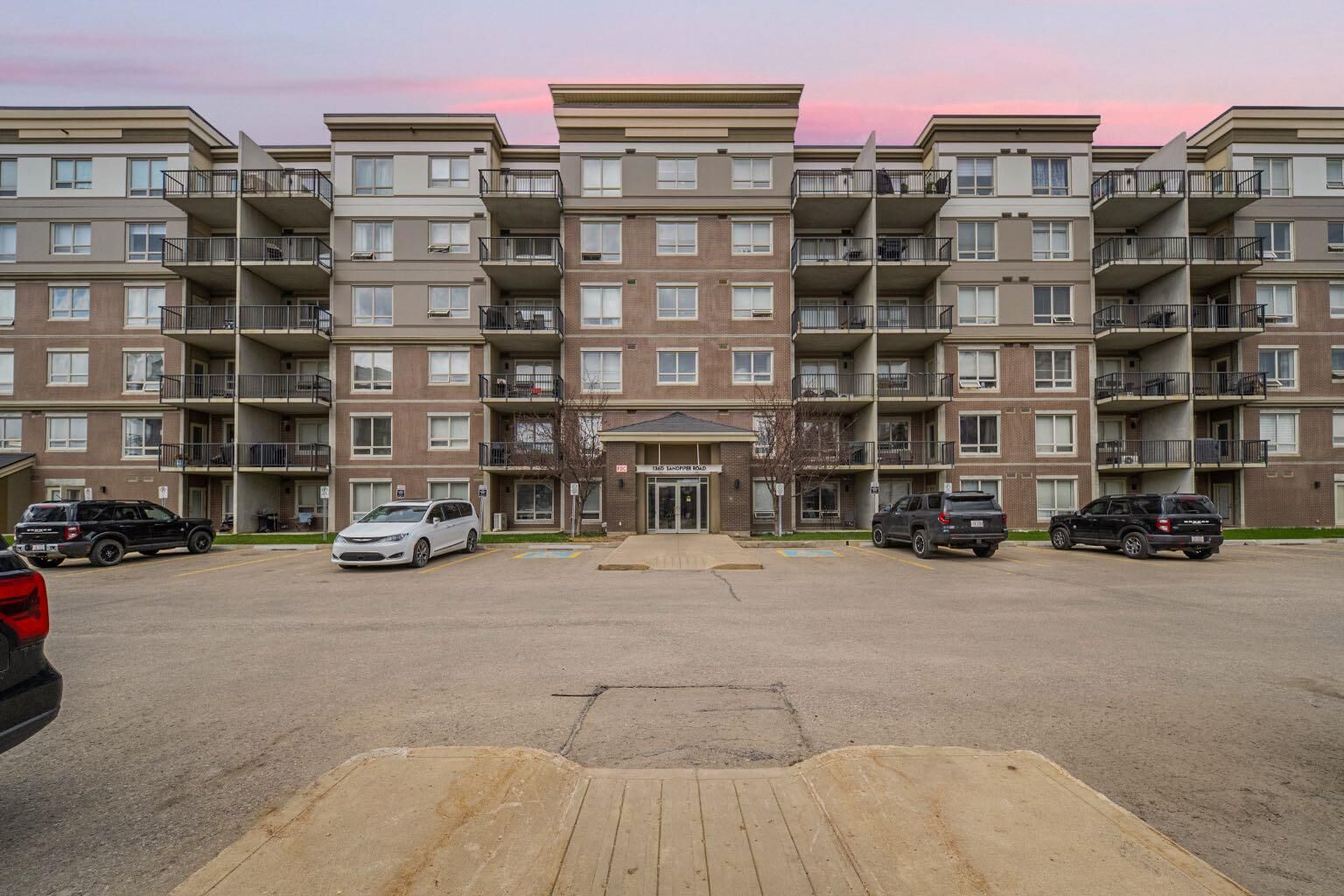 Property Photo: 136D Sandpiper Road 402 AB T9K 0J7