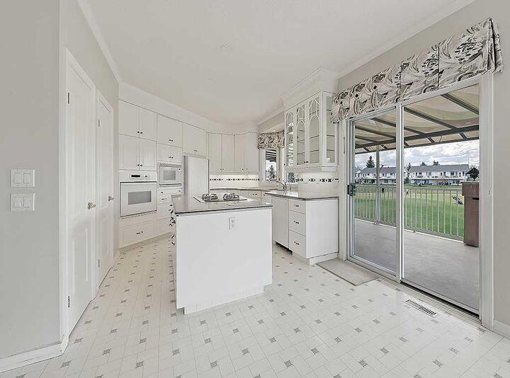 Property Photo:  1217 High Country Drive NW  AB T1V 1E3 