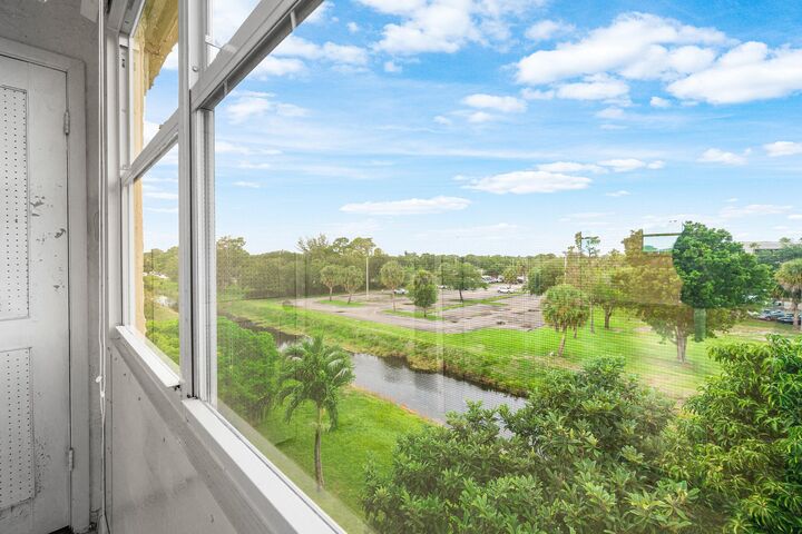 Property Photo:  725 Lori Drive 410  FL 33461 