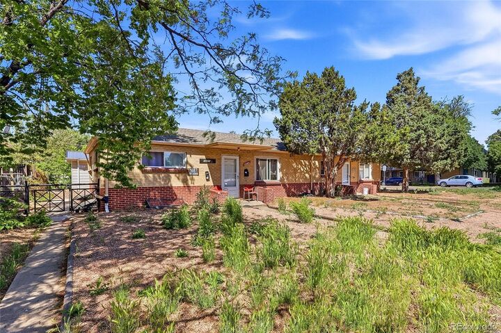 Property Photo: 1685 Chester Street CO 80010