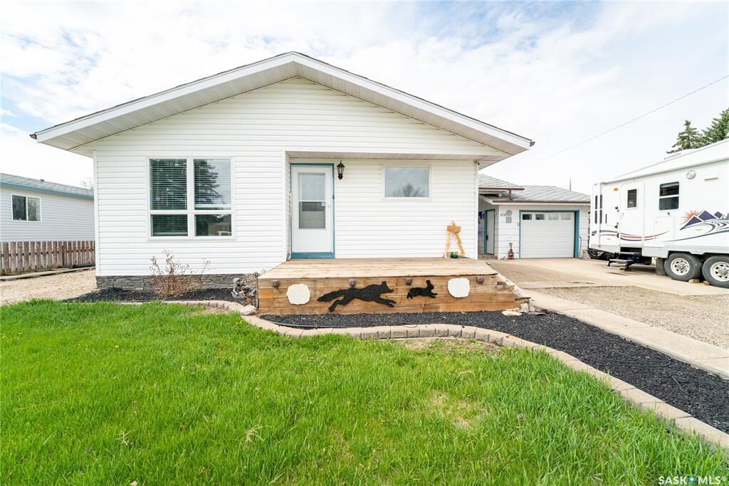 Property Photo:  406 Walter Scott Avenue  SK S0G 2E0 