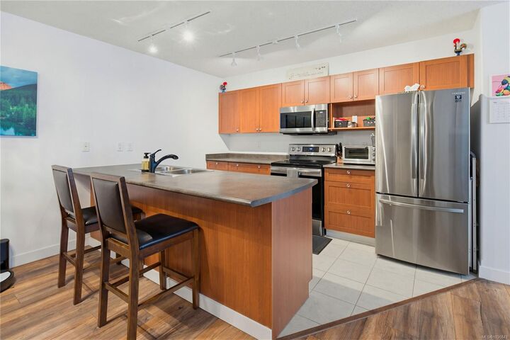 Property Photo:  2823 Jacklin Rd 205  BC V9B 3Y1 