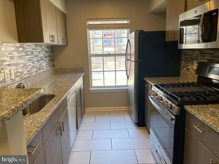 Property Photo:  8911 -C Town Center Circle 212  MD 20774 