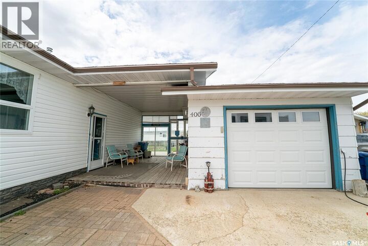 Property Photo:  406 Walter Scott Avenue  SK S0G 2E0 