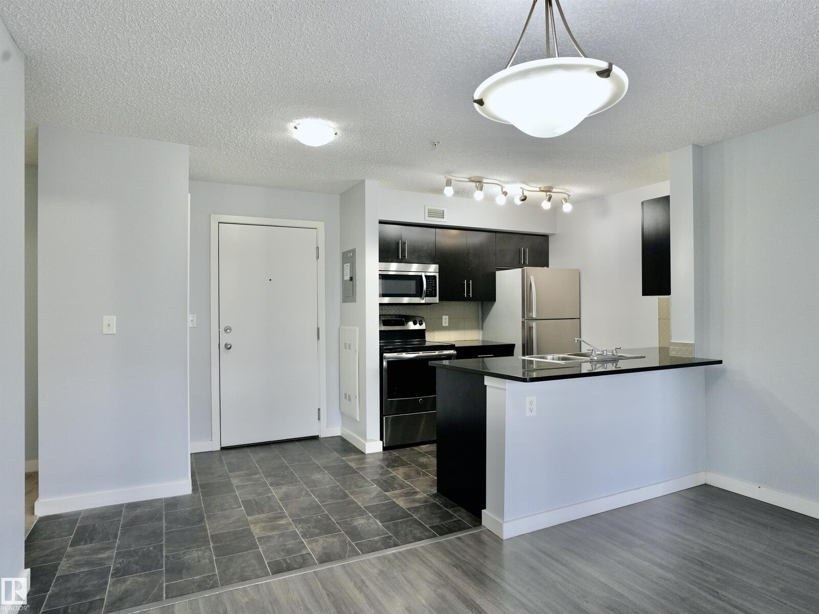 Property Photo: 5816 Mullen Place NW 320 AB T6R 0W3