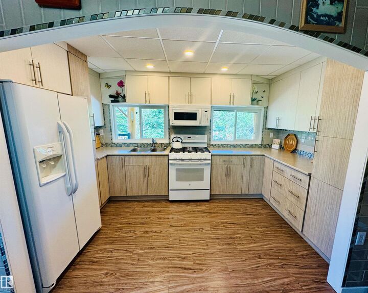 Property Photo: 401 60501 RR 120 AB T0A 3A0