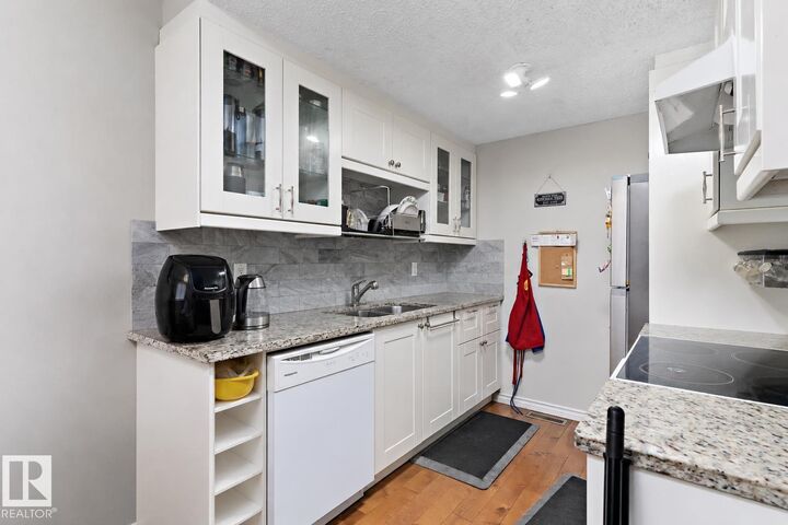 Property Photo:  6617 180 Street NW  AB T5T 2A3 