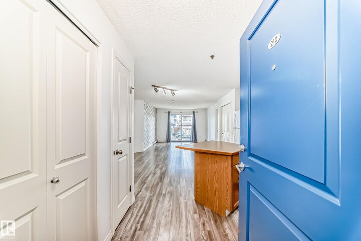 Property Photo:  2305 35A Avenue NW 210  AB T6T 1Z2 