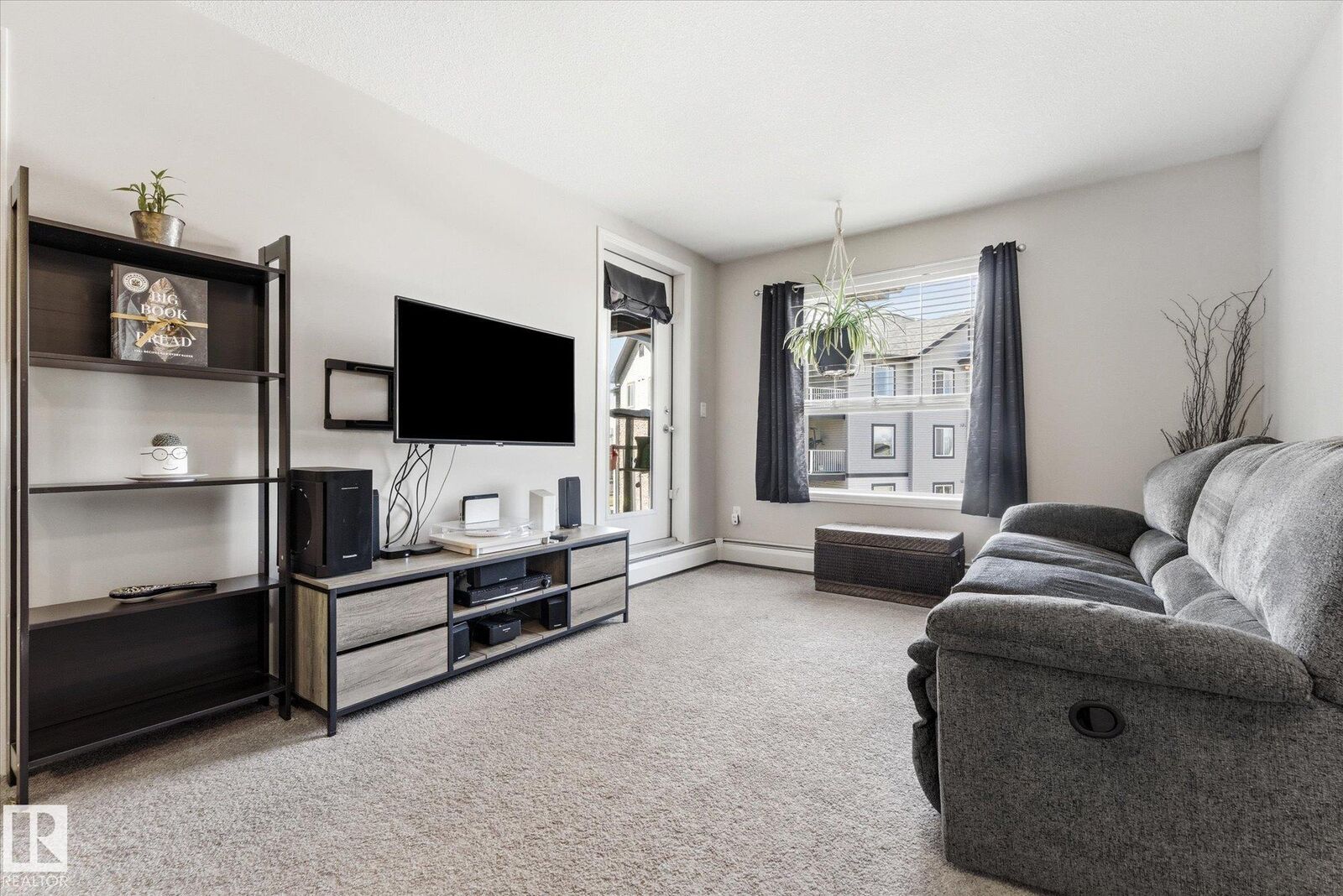 Property Photo:  42 Summerwood Boulevard 410  AB T8H 0C3 
