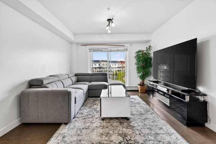 Property Photo: 302 Skyview Ranch Drive NE 2303 AB T3N 0P5