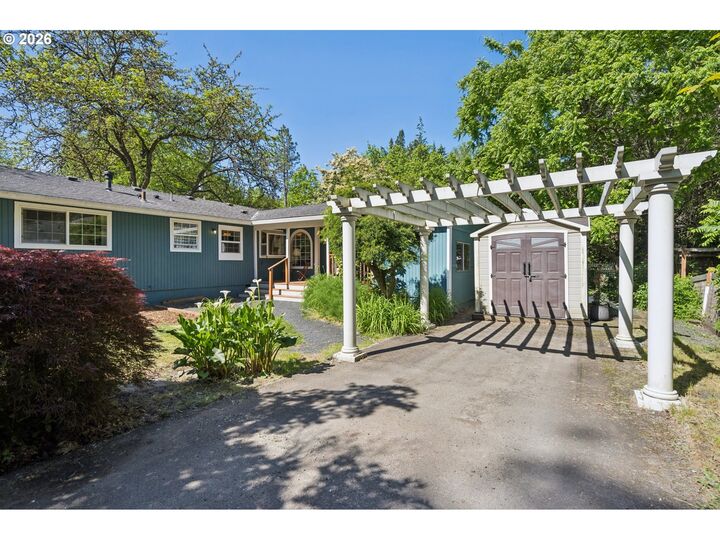 Property Photo:  10835 SW 39th Ave  OR 97219 