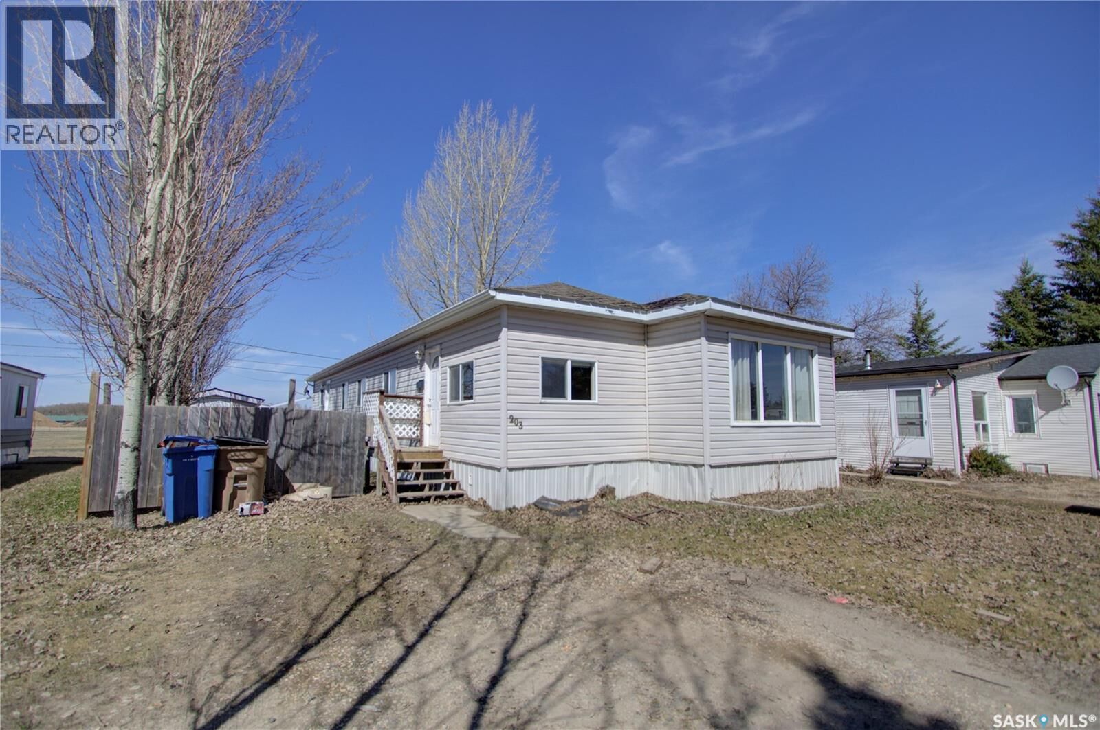 Property Photo:  203 5th Avenue  SK S0E 1A0 