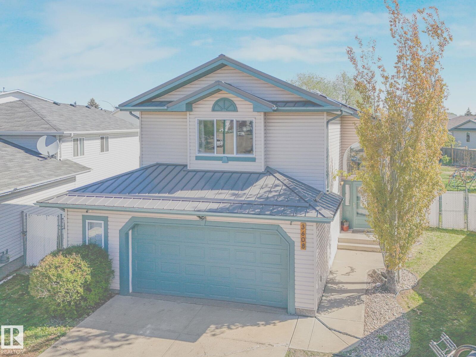 Property Photo:  3608 130 Avenue NW  AB T5A 5G1 