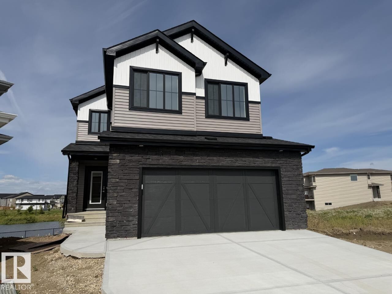 Property Photo: 2431 Egret Loop NW AB T6M 3G9