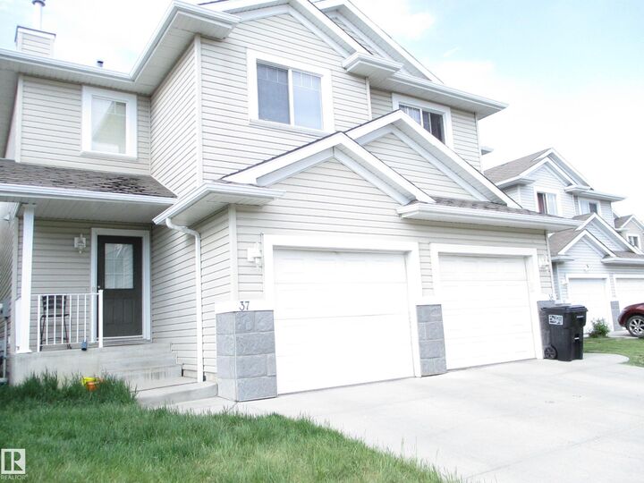 Property Photo: 287 Macewan Road SW 37 AB T6W 1T4