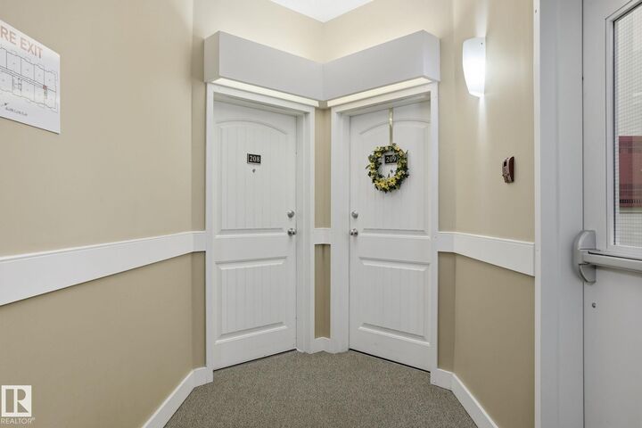 Property Photo:  4922 52 Street 208  AB T0G 1N0 