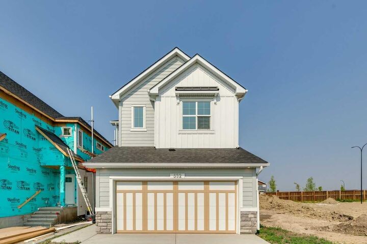 Property Photo: 532 Buffaloberry Manor SE AB T3M 4G6