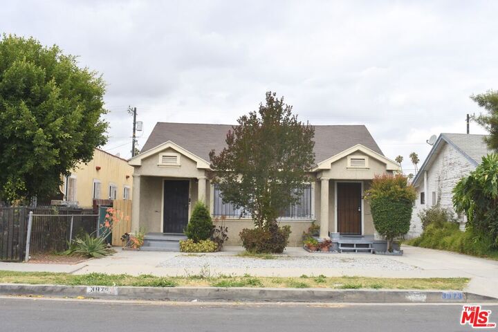 Property Photo:  3973 S Van Ness Ave  CA 90062 