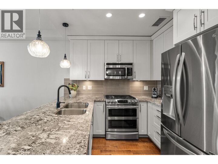 Property Photo: 5099 Springs Boulevard 313 BC V4M 0A2