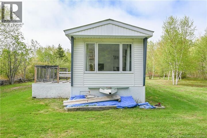 Property Photo:  95 Acadie Street  NB E8N 1A1 