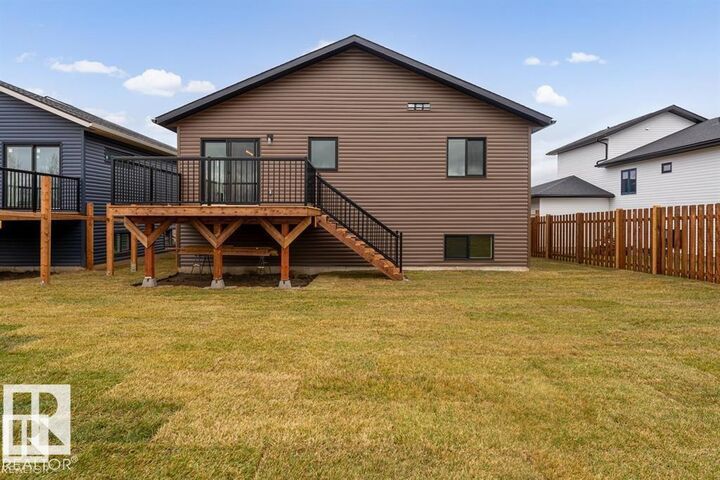 Property Photo:  303 Fundy Way  AB T9M 0M4 