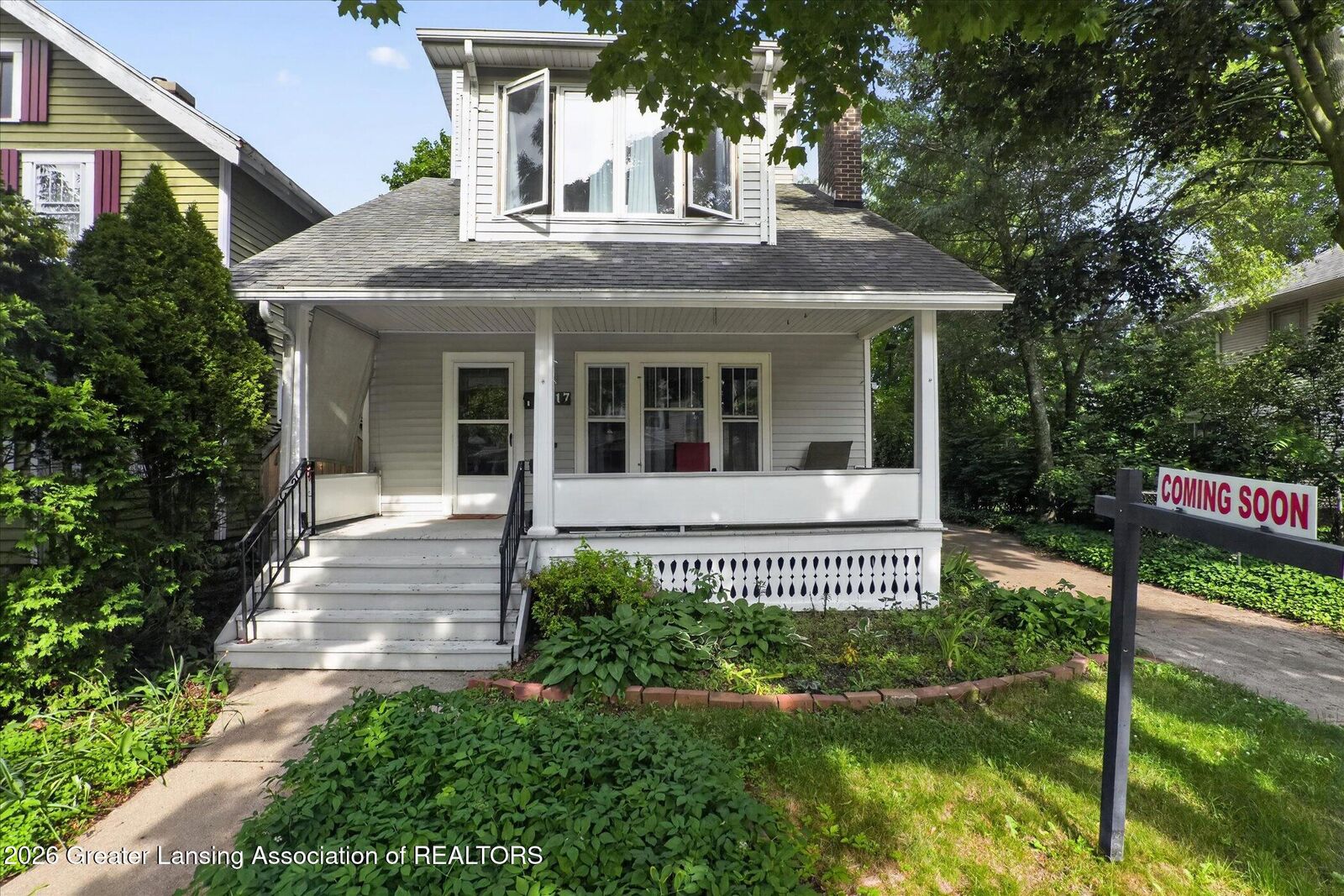 Property Photo:  217 Rosamond Street  MI 48912 