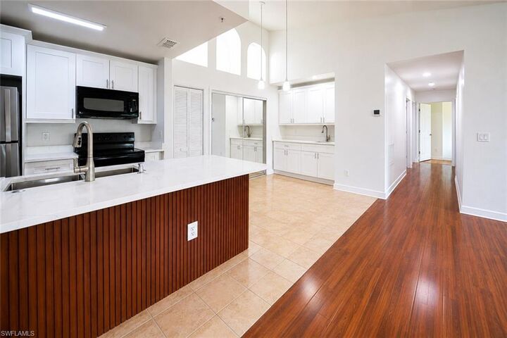 Property Photo:  14895 Pleasant Bay Ln 5202  FL 34119 
