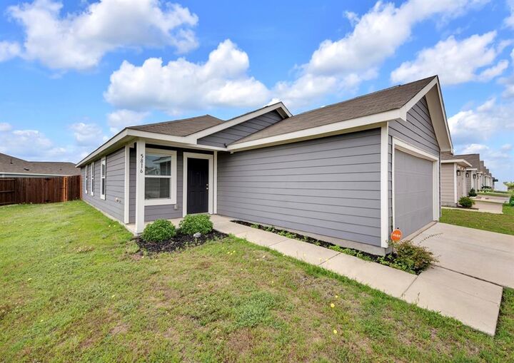 Property Photo: 5816 Rockrose Lane TX 75407