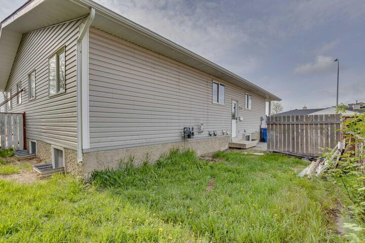 Property Photo: 108 Caldwell Crescent AB T9K 1G2