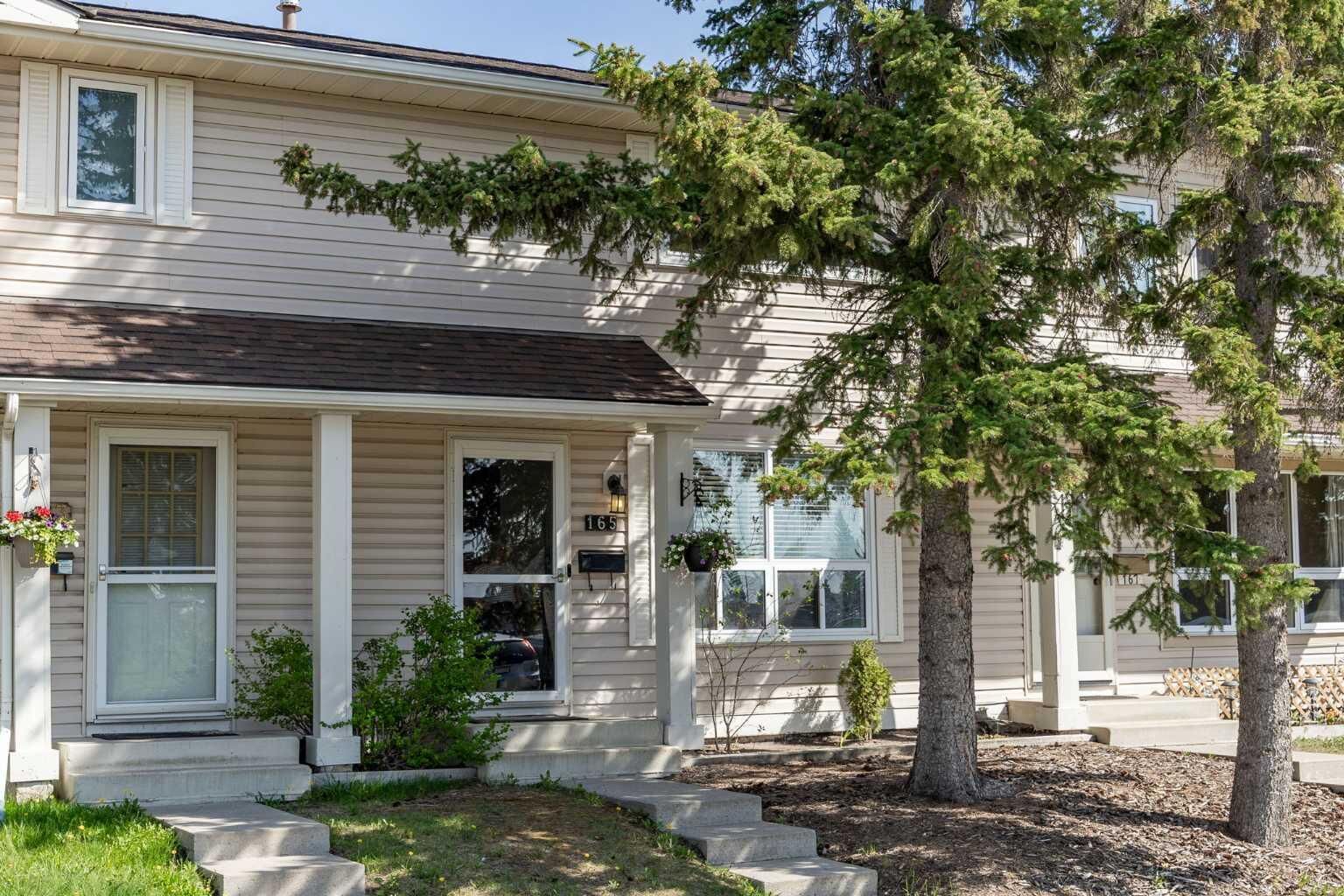 Property Photo:  165 Woodmont Terrace SW  AB T2W 4Z4 