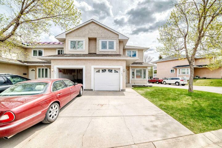 Property Photo: 388 Sandarac Drive NW 109 AB T3K 4E3