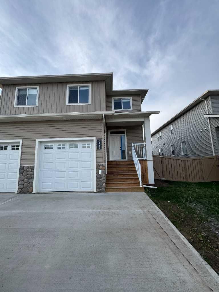 Property Photo:  10213B 149 Avenue  AB T8X 0R9 