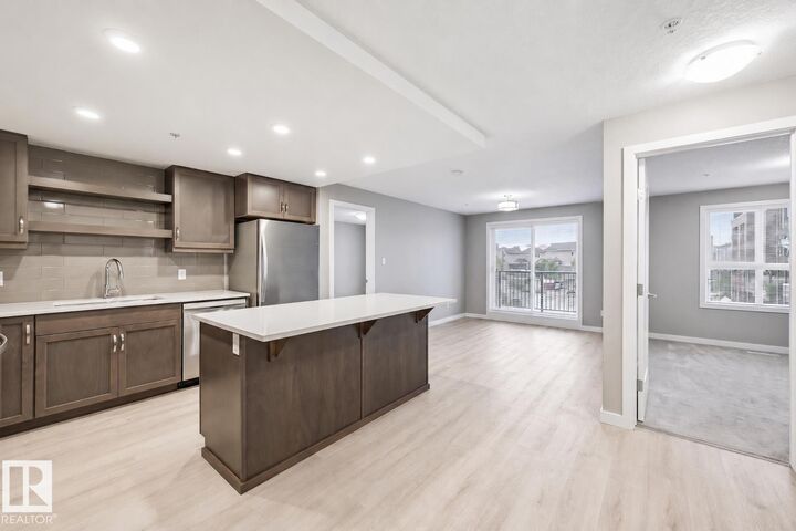 Property Photo:  5504 Schonsee Drive NW 232  AB T5Z 0N9 