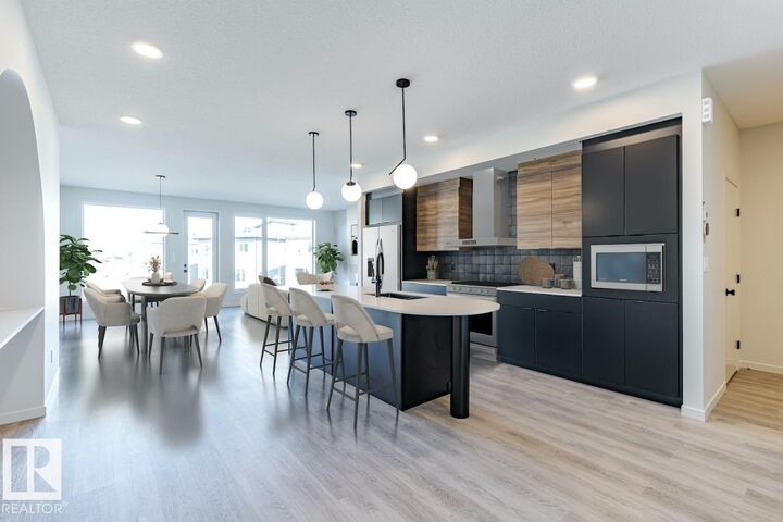 Property Photo: 7387 Klapstein Crescent SW AB T6W 0A6