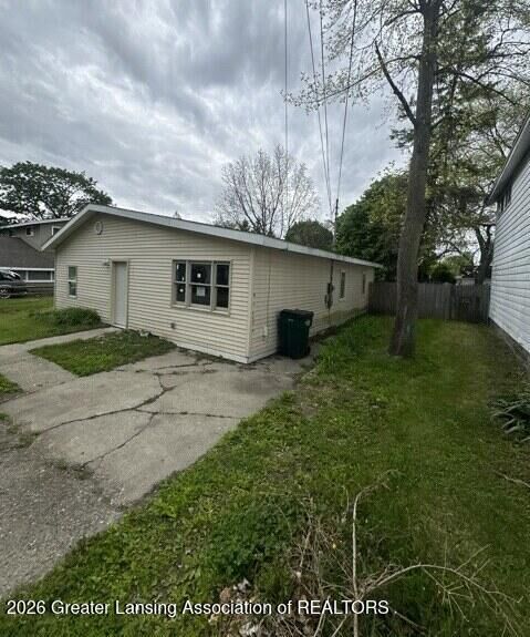 Property Photo:  1020 R G Curtiss Avenue  MI 48911 